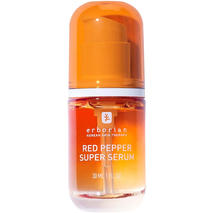 Erborian Red Pepper Super Serum 30 ml lystergivande ansiktsserum i en genomskinlig orange glasflaska med pump