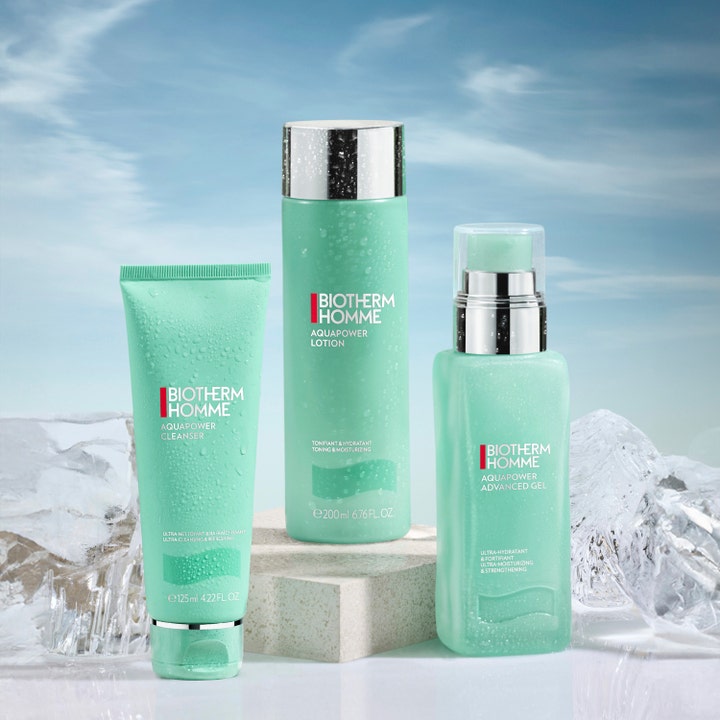 Biotherm Homme Aquapower Advanced Gel 75 ml återfuktande ansiktskräm i mintgrön flaska bland is och vattendroppar.