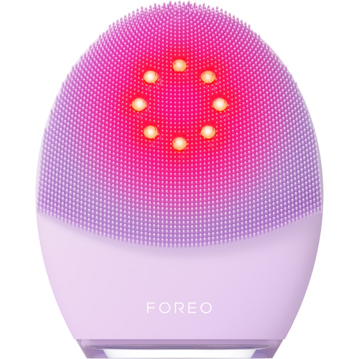 Foreo Luna 4 Plus lila elektrisk borste för ansiktsrengöring med rött LED-ljus och mjuka silikonstrån.