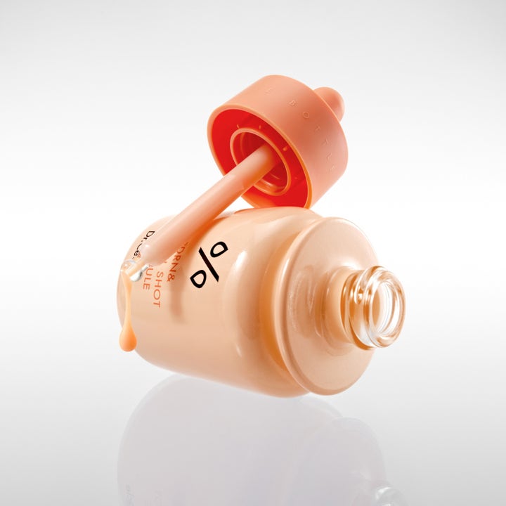 Dr. Ceuracle PDRN & Retinol Shot Ampoule 30 ml ansiktsserum i persikofärgad flaska med droppe från en pipett