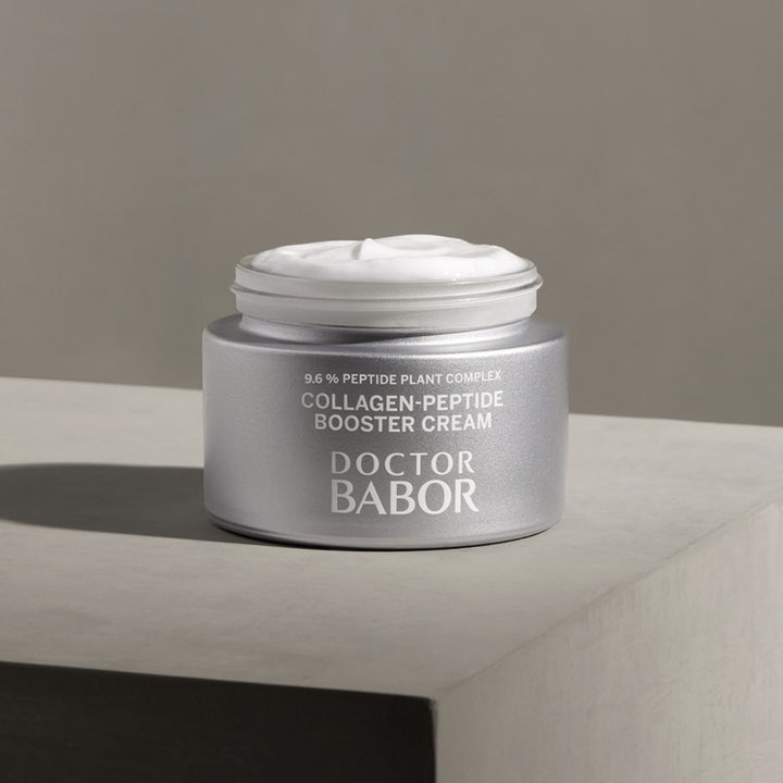 Babor DOC Collagen-Peptide Booster Cream 50 ml uppstramande ansiktskräm i öppen silverburk med vit krämig textur.