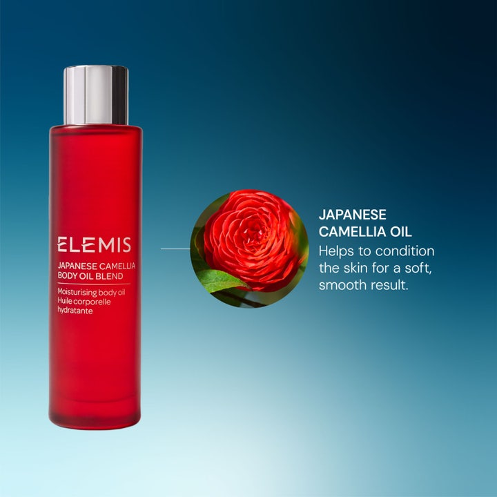 Elemis Japanese Camellia Oil Blend 100 ml närande kroppsolja i röd flaska bredvid en röd kameliablomma