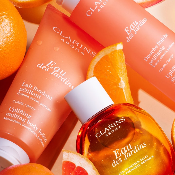 Clarins Eau des Jardins Uplifting Fresh Shower Gel 200 ml uppfriskande naturlig duschtvål bland fräscha apelsinskivor