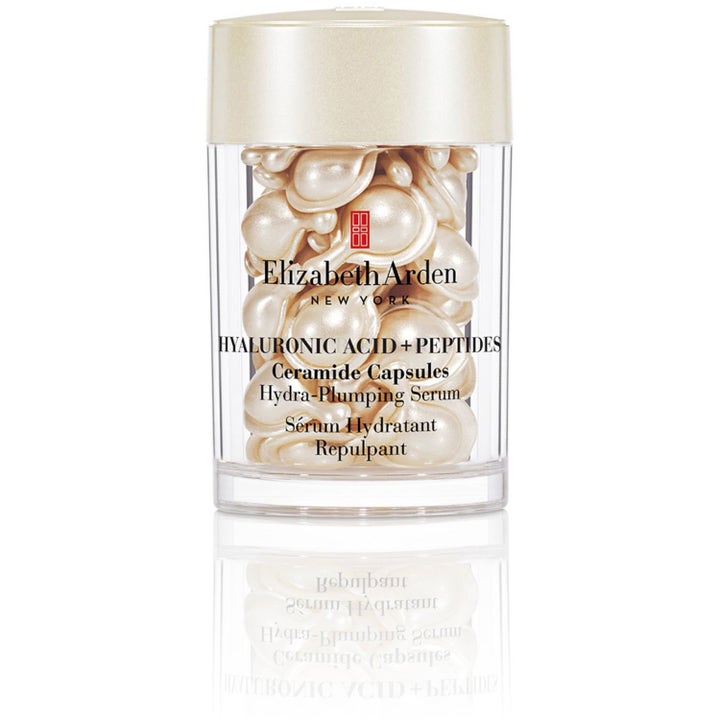 Elizabeth Arden Hyaluronic Acid + Peptides Ceramide Capsules återfuktande serum i burk med pärlemorskimrande kapslar.