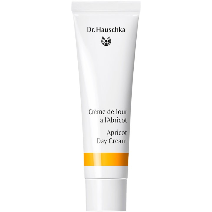 Dr. Hauschka Apricot Day Cream 30 ml lystergivande ansiktskräm i vit tub med orange detalj.