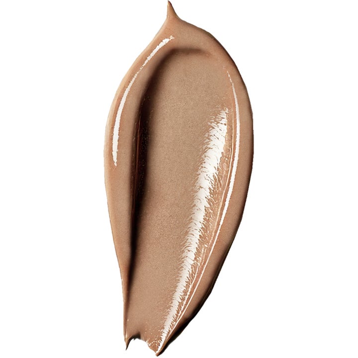 Verso N°2 Daily Glow 30 ml lystergivande serum med Retinol 8 visar en krämig och skimrande bronsfärgad textur