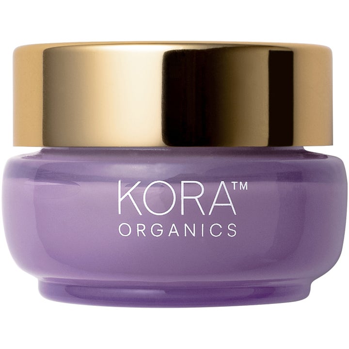 KORA Organics Plant Stem Cell Retinol Alternative 50 ml utslätande ansiktskräm i lila glasburk med glänsande guldlock