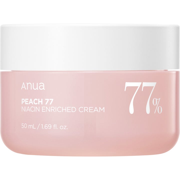 Anua Peach 77 Niacin Enriched Cream 50 ml lystergivande peachkräm i en frostad persikorosa burk med vitt lock.