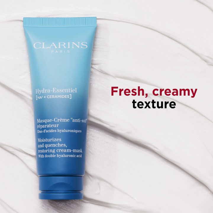 Clarins Hydra-Essentiel 75 ml ansiktsmask med dubbel hyaluronsyra och ceramider i blå tub på en krämig vit textur.