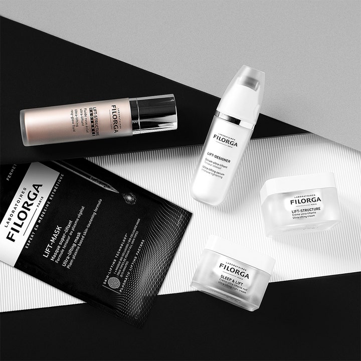 Filorga Lift-Mask 23 ml ansiktsmask för fastare hud i svart sachet med andra produkter i Lift-serien