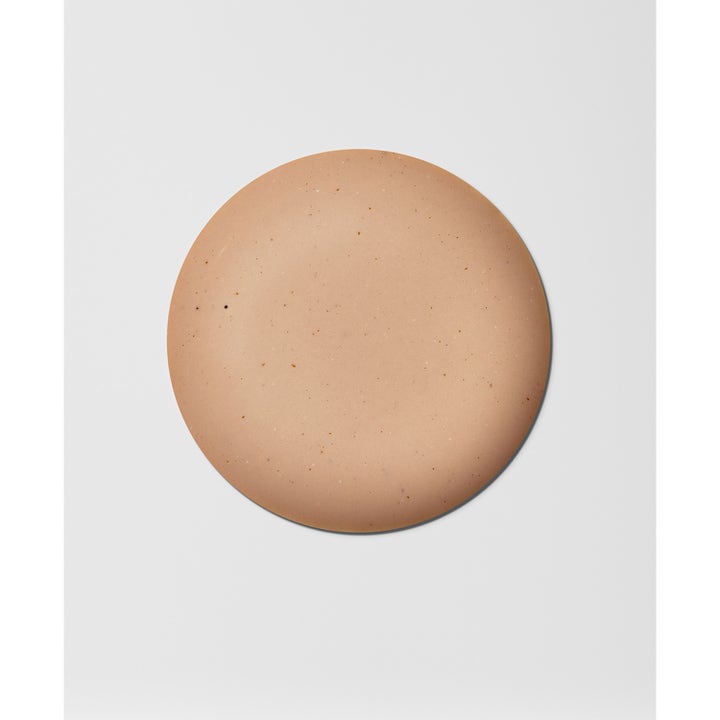 Heliocare Pigment Solution Fluid SPF 50+ 50 ml anti pigmentfläckar fluid med beige lättflytande textur.