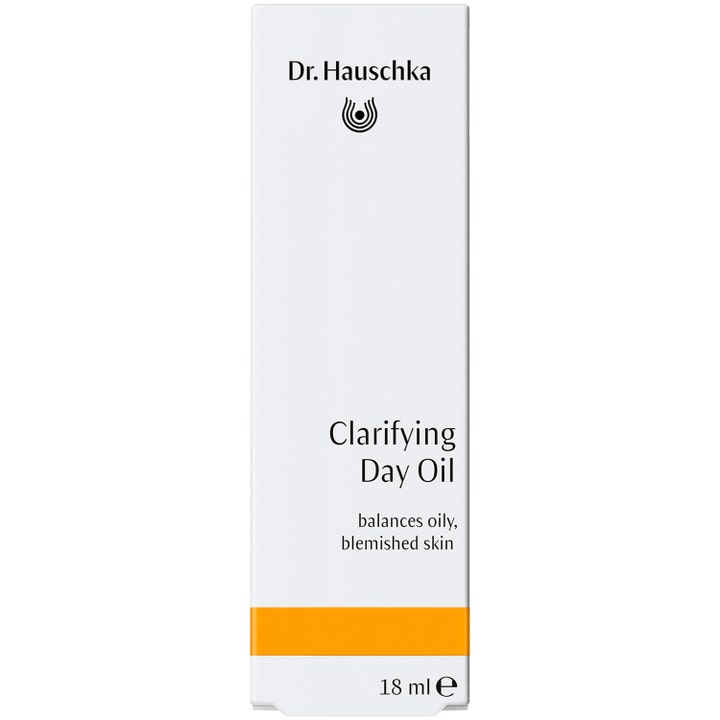 Dr. Hauschka Clarifying Day Oil 18 ml ekologisk ansiktsolja ger talgbalans i vit ytterförpackning med orange rand.