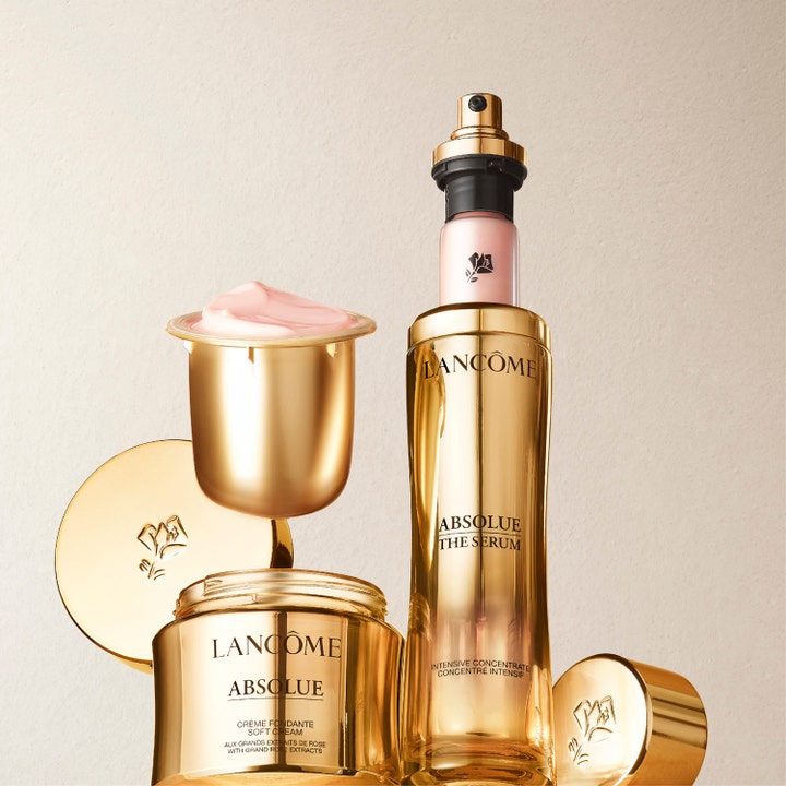 Lancôme Absolue The Serum 30 ml lyxserum anti aging i guldflaska intill en guldburk med rosa ansiktskräm