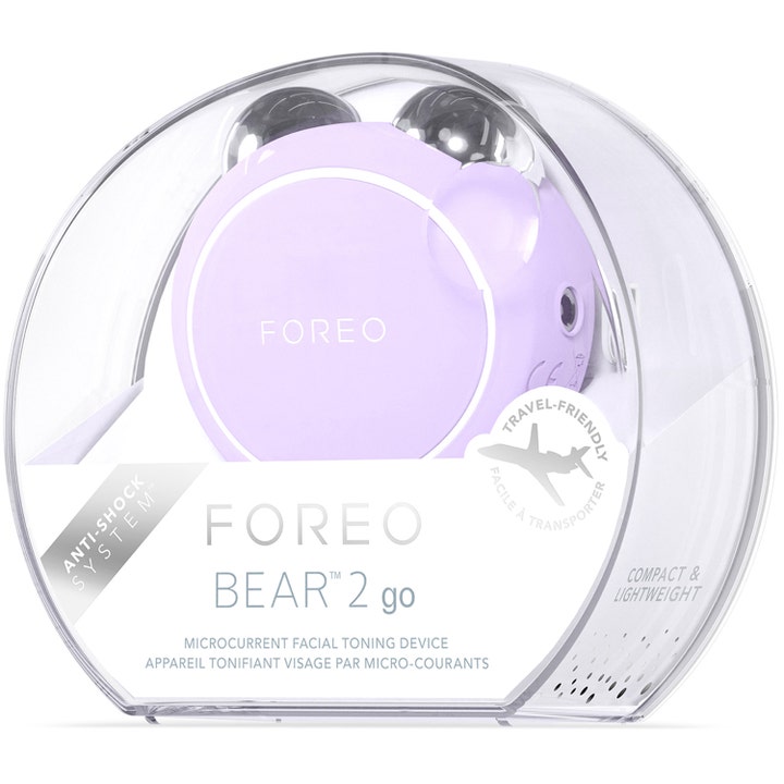 FOREO BEAR 2 go Lavender 1 st mikroström för ansiktet i en rund genomskinlig förpackning märkt travel-friendly.