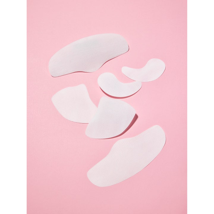 Mixsoon Melting Collagen Cheek Film 5 st ansiktsmask ger fasthet med vita nätmönstrade filmer på rosa bakgrund