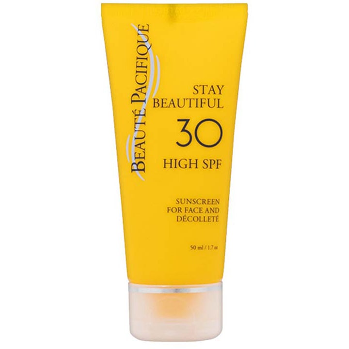 Beauté Pacifique Stay Beautiful 50 ml ansiktssolskydd hög spf i en klargul tub som ger anti-age effekt.