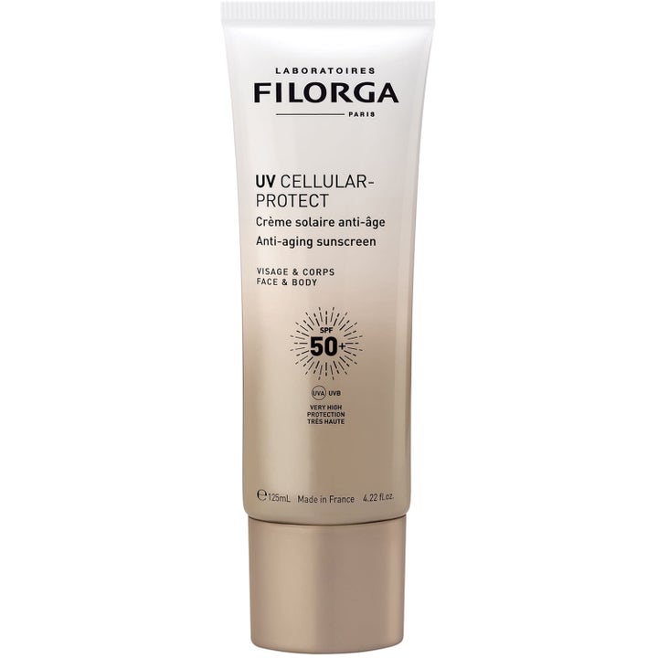 Filorga UV Cellular-Protect 125 ml solkräm SPF 50+ mot åldrande i en vit och guldfärgad tub med matchande kork