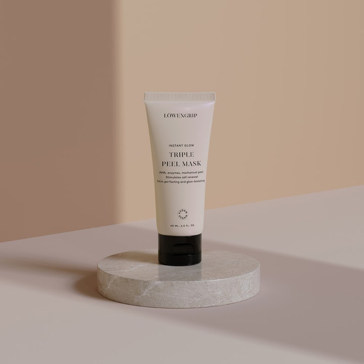 Löwengrip Instant Glow Triple Peel Mask 60 ml aha ansiktsmask som stimulerar cellförnyelse i tub på stenpodium