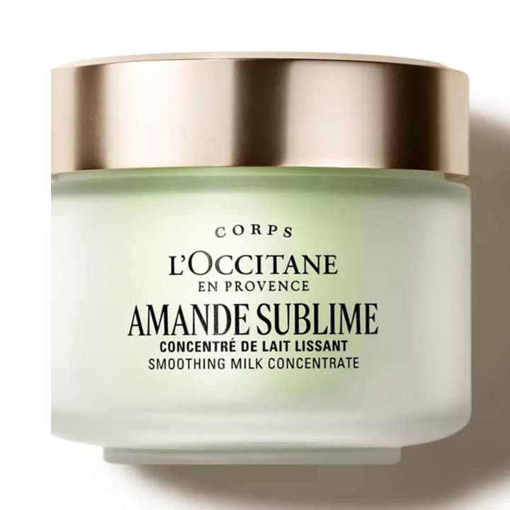 L'Occitane Amande Milk Concentrate 200ml fast mandelkräm för kroppen i en rund glasburk med glansigt silverlock.