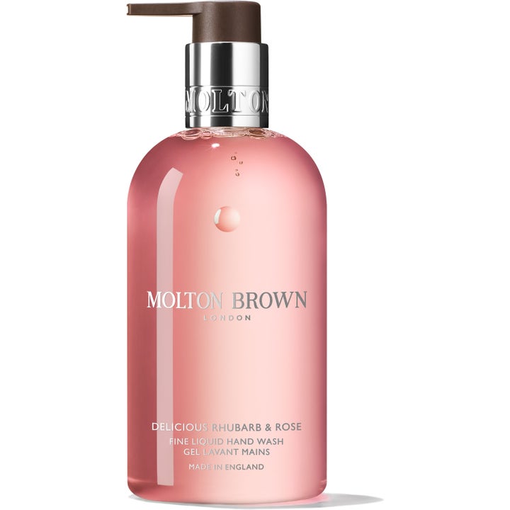 Molton Brown Delicious Rhubarb & Rose 300 ml rengörande handtvål med rosa gel i genomskinlig flaska med silverpump.