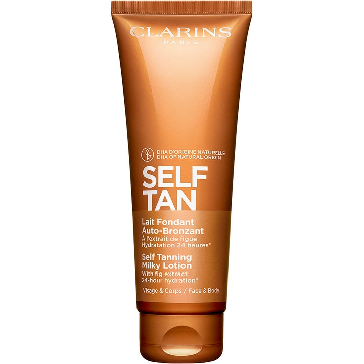 Clarins Self Tanning Milky Lotion självbrunande lotion ger solkysst lyster i en skimrande bronsfärgad tub.