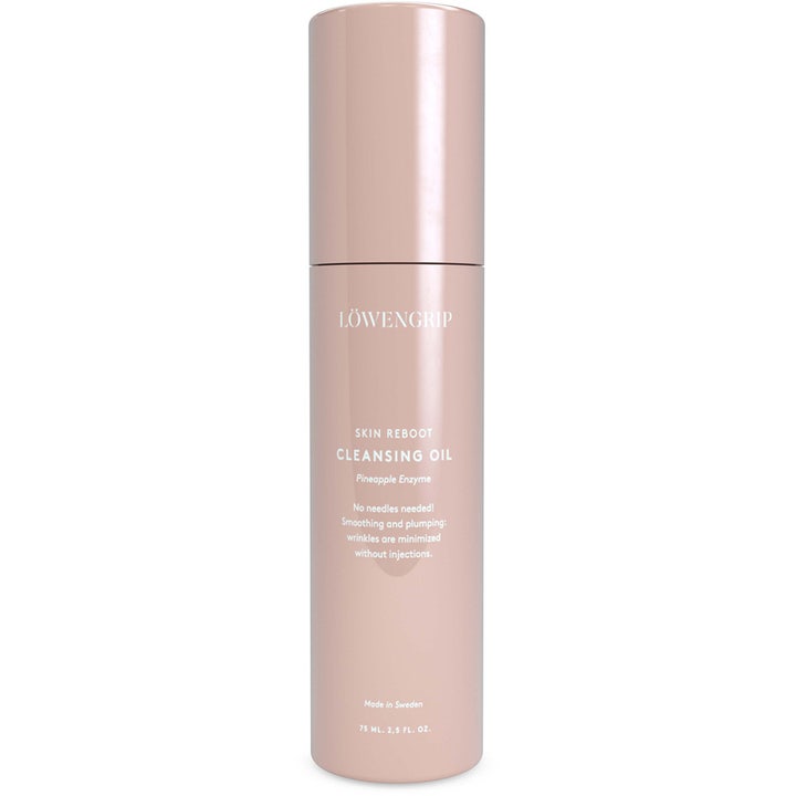 Löwengrip Skin Reboot Cleansing Oil 75 ml anti-age rengöringsolja för ansiktet i en puderrosa flaska för glödande hud.