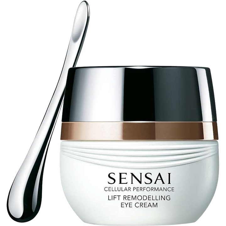 Sensai Lift Remodelling Eye Cream upplyftande ögonkräm mot åldrande i vit burk med silverlock och silverfärgad spatel.