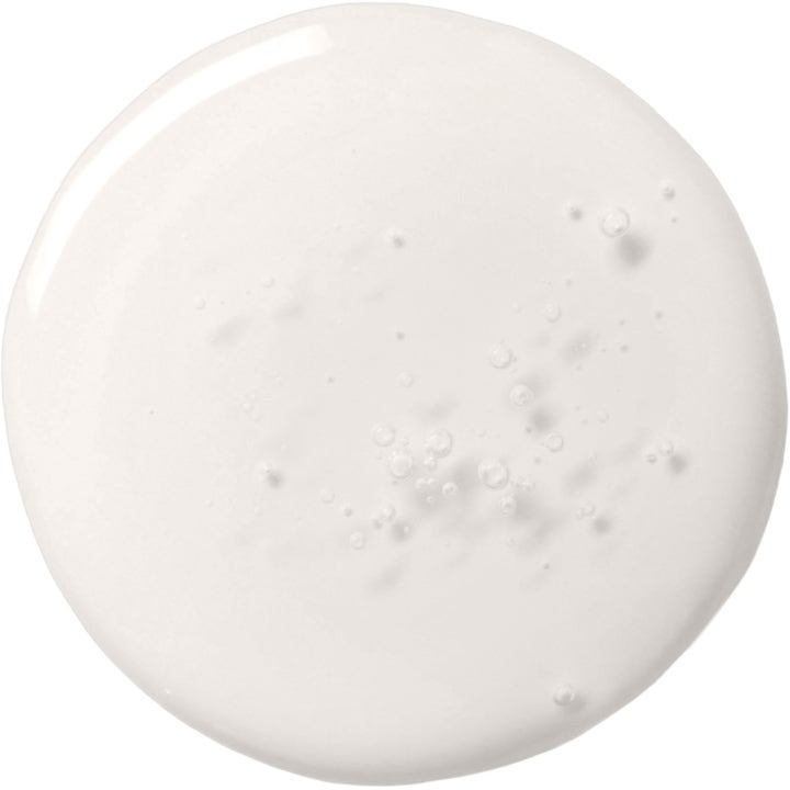 KORRES Smart Yoghurt Probiotic Super Serum 30 ml ansiktsserum med en mjölkvit lättflytande textur och små bubblor