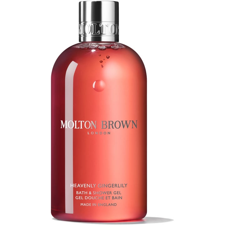 Molton Brown Heavenly Gingerlily 300 ml duschtvål från England ger en lyxig parfym i en klar flaska med korallröd gel.
