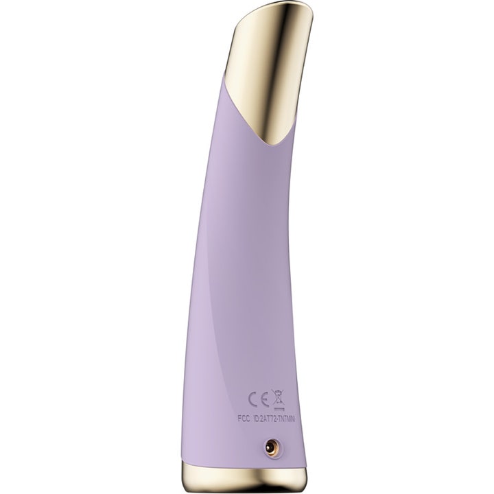FAQ Swiss FAQ 101 LED-Pulse Facial Device Amethyst 1 st ger lyster lila silikonenhet med eleganta gulddetaljer.