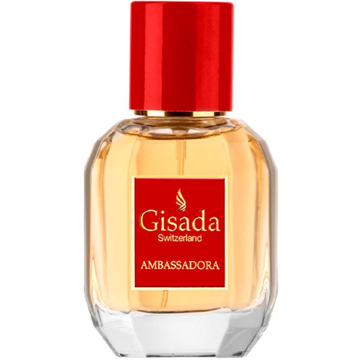 Gisada Ambassadora 50ml eau de parfum i en facetterad glasflaska med djupröd kork och bärnstensfärgad vätska