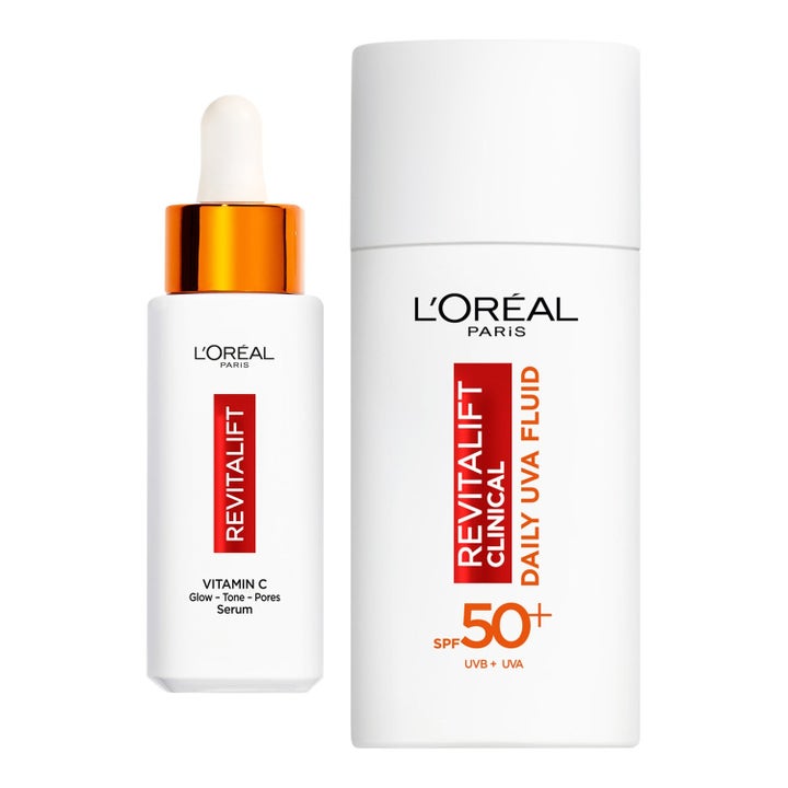 L'Oréal Paris Revitalift Clinical Vitamin C Serum och SPF 50+ Fluid ger lyster i vita flaskor med orangea detaljer.