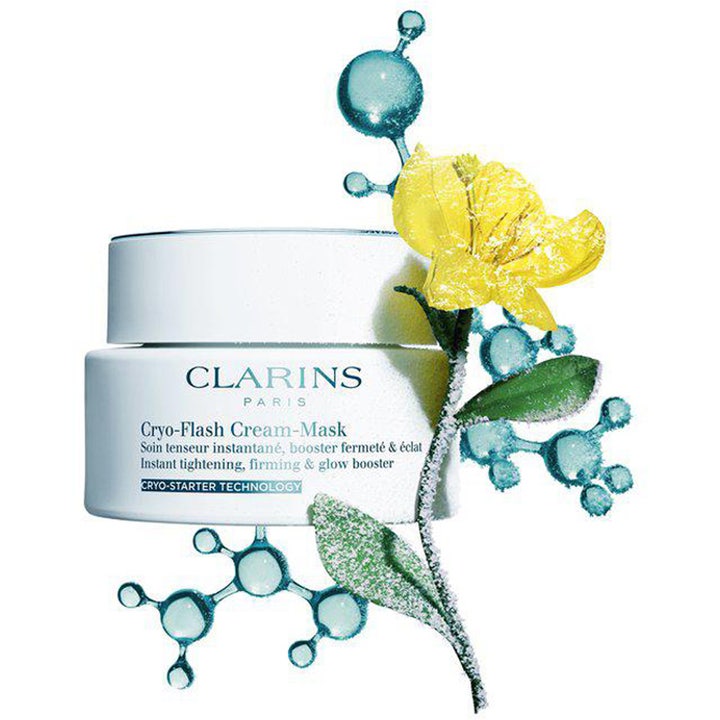 Clarins Cryo-Flash Cream-Mask 75 ml ansiktsmask för omedelbar lyster och fastare hud med gul blomma och blå molekyler.