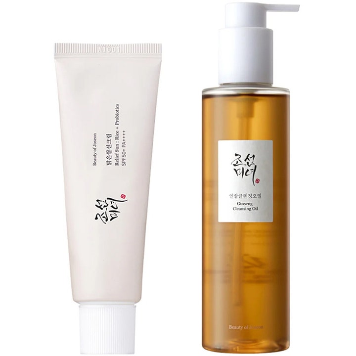 Beauty of Joseon Relief Sun och Ginseng Cleansing Oil som rengör och ger lyster i vit tub och bärnstensfärgad pumpflaska