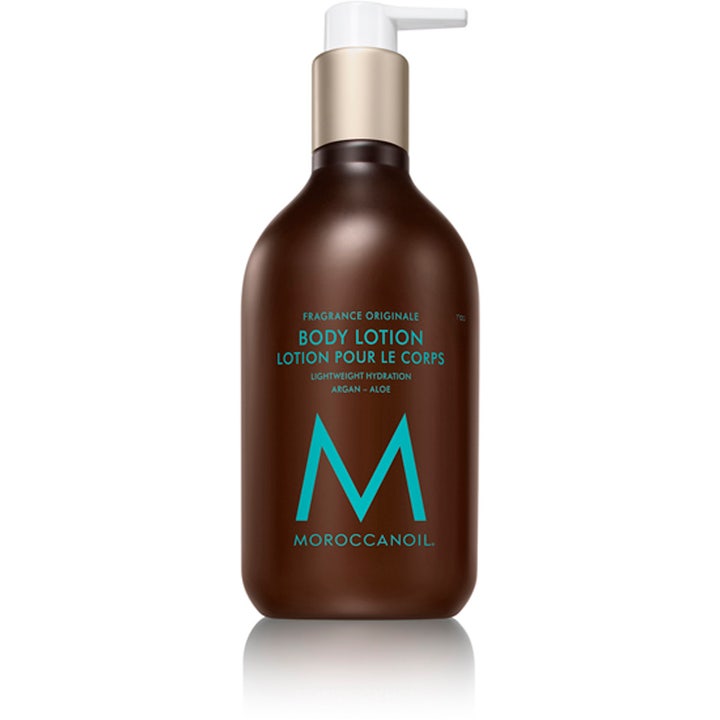 Moroccanoil Body Lotion Fragrance Originale argan återfuktande kräm i en brun pumpflaska med vit dispenser och turkos text.