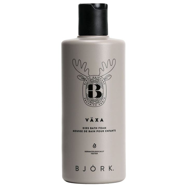 Björk Växa Kids Bath Foam barnbad för känslig hud i beige plastflaska med svarta horn och svart snäpplock.