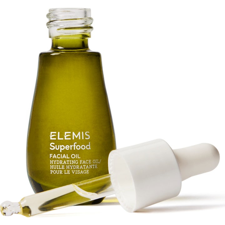 Elemis Superfood Facial Oil 15 ml naturlig ansiktsolja för glöd i mörkgrön glasflaska med öppen vit pipett