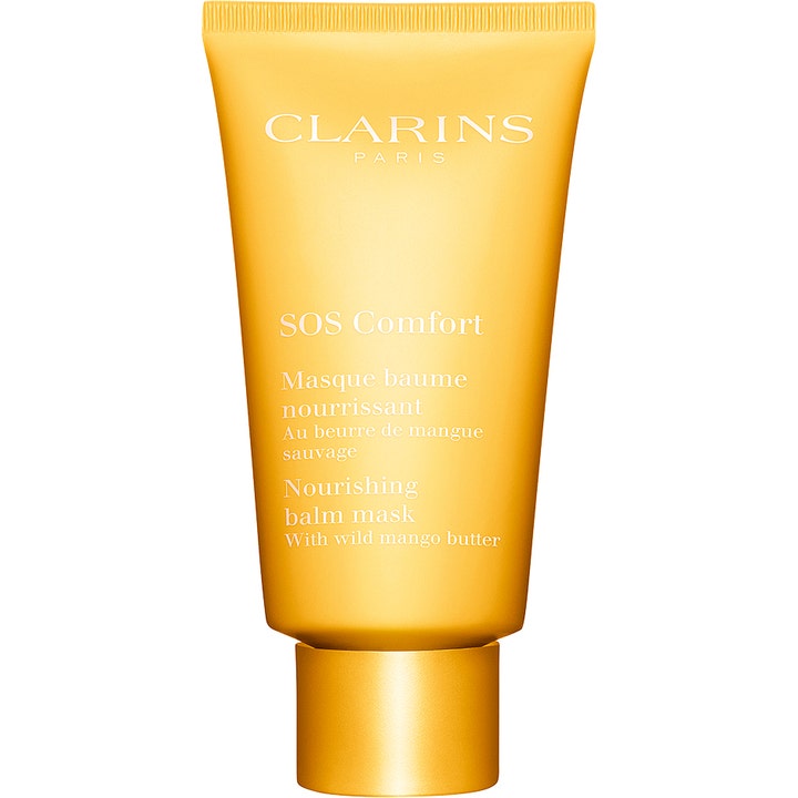 Clarins SOS Comfort intensivt närande mask för torr känslig hud i en gul tub med matchande guldlock