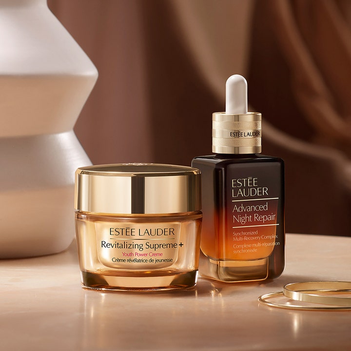Estée Lauder Advanced Night Repair 75 ml anti-aging återfuktande serum bredvid Revitalizing Supreme kräm.