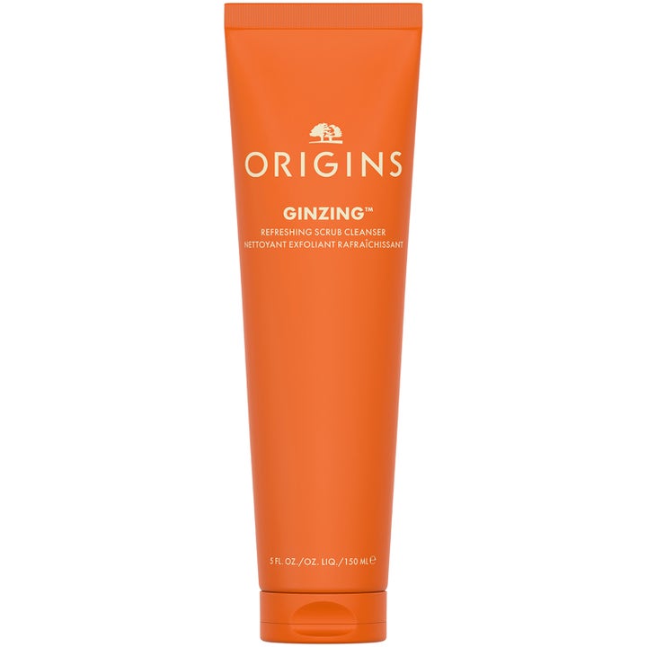 Origins GinZing 150 ml exfolierande ansiktsrengöring i orange tub som ger en klar lyster med ginseng.