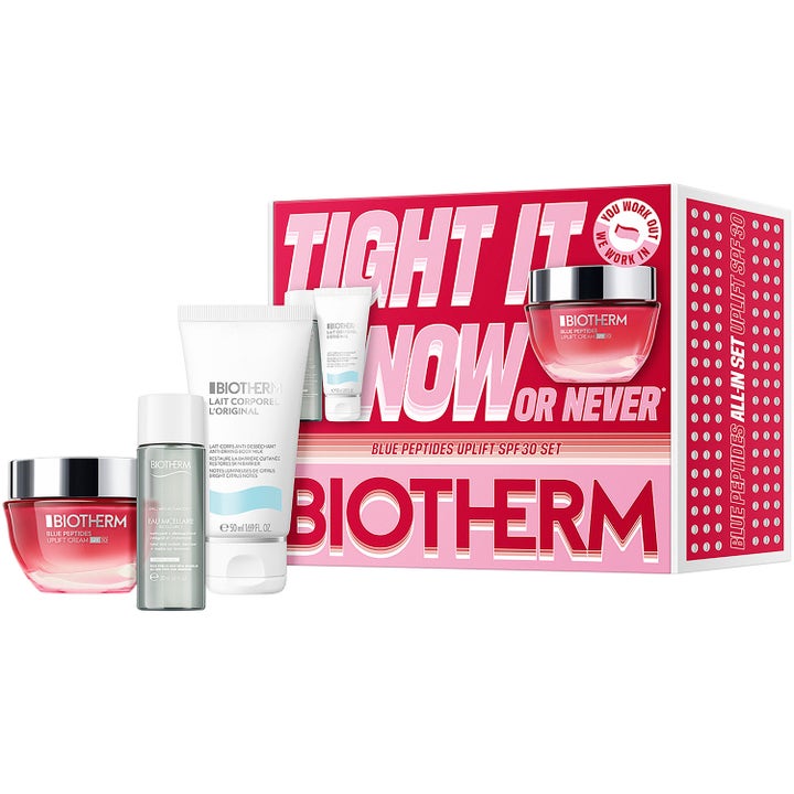 Biotherm Blue Peptides Uplift SPF 30 Set fasthetsgivande hudvård med rosa glasburk och vita tuber framför en presentask.