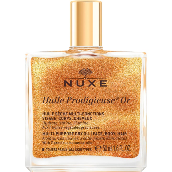 Nuxe Huile Prodigieuse Or 50 ml närande skimmerolja för ansikte kropp och hår med guldskimmer i en fyrkantig glasflaska.