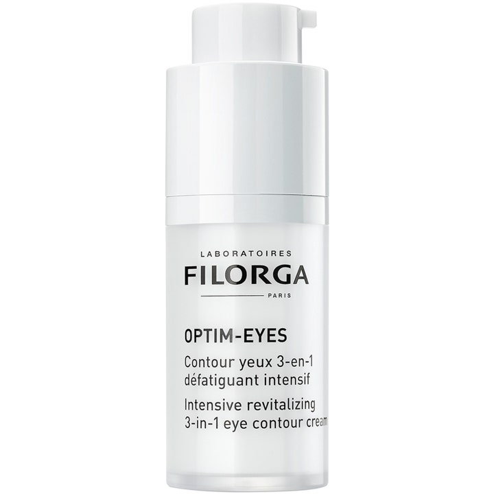 Filorga Optim-Eyes 15 ml 3-i-1 ögonkräm mot mörka ringar i en vit cylinderformad pumpflaska för piggare blick