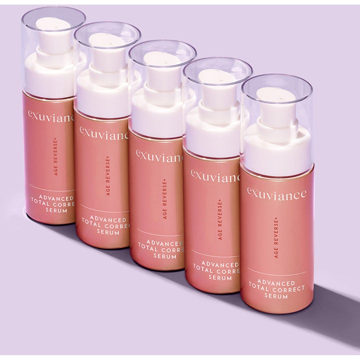 Exuviance Age Reverse Total Correct + Sculpt Serum 30 ml uppstramande serum i fem rosa pumpflaskor på rad