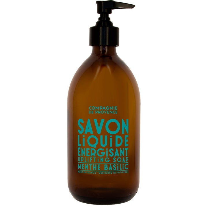 Compagnie de Provence Savon Liquide Menthe Basilic energigivande minttvål i brun glasflaska med svart pump och turkos text