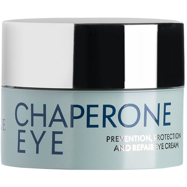 Chaperone Eye reparerande ögonkräm i en ljusblå burk med ett glansigt och reflekterande silverlock.