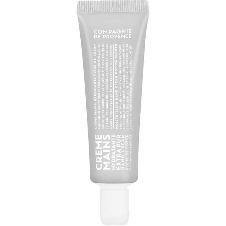 Compagnie de Provence Cotton Flower Hand Cream 30 ml är en återfuktande handkräm i en stilren grå plasttub.