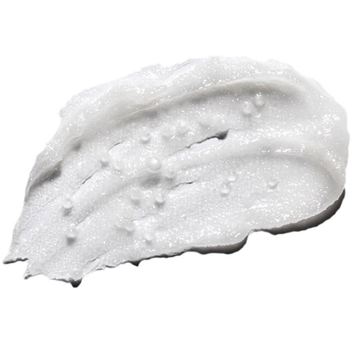 Verso N°1 Cleansing Balm 100 ml ansiktsrengöring visar en vit krämig formula med exfolierande jojobapärlor.
