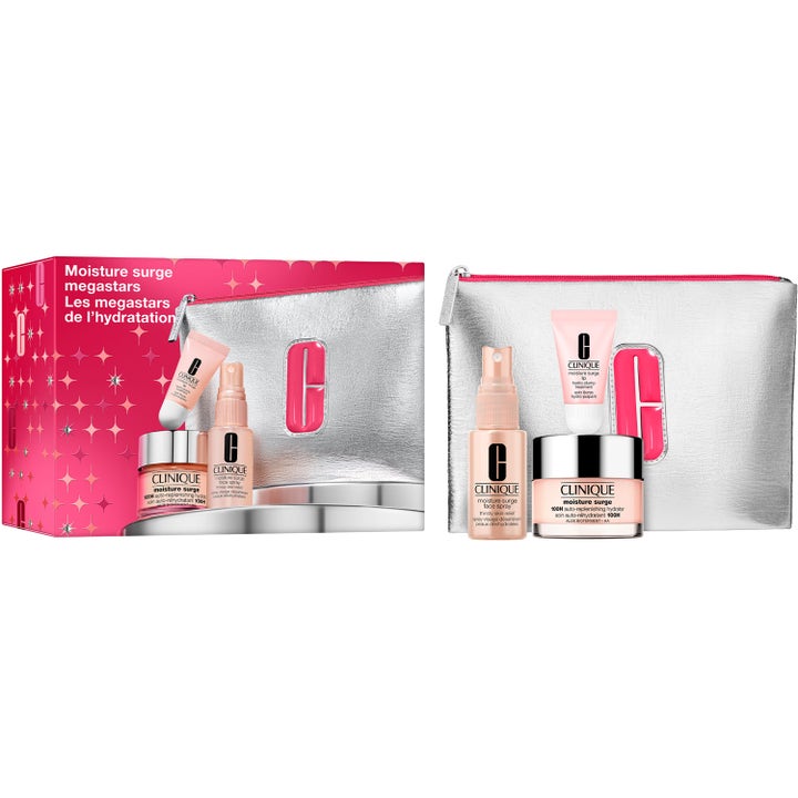 Clinique Moisture Surge Megastars återfuktande set med en silvrig necessär och rosa hudvårdsprodukter i box