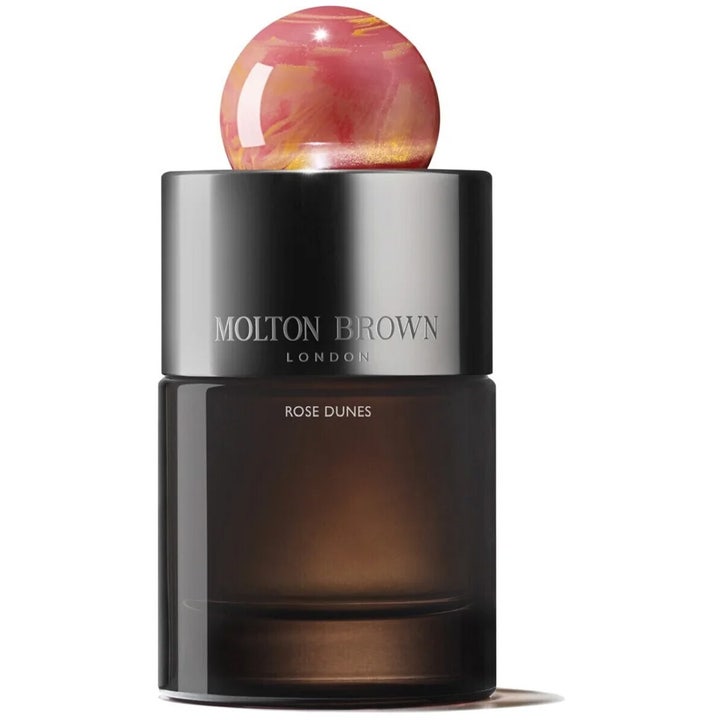 Molton Brown Rose Dunes Eau de Parfum 100 ml eau de parfum ros i mörk glasflaska med dekorativ rosa och guld kula